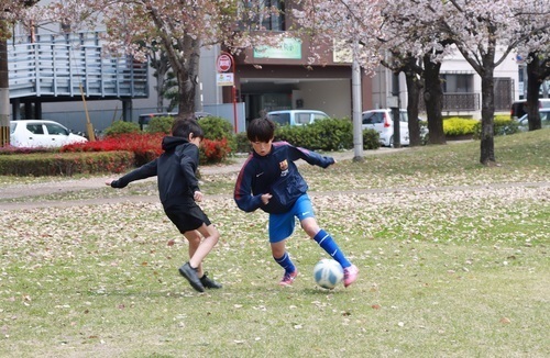 田代選手がサッカーをする様子