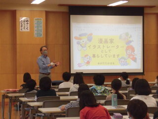 2枚目：華為技術日本株式会社（ファーウェイジャパン）からの講演の様子の写真